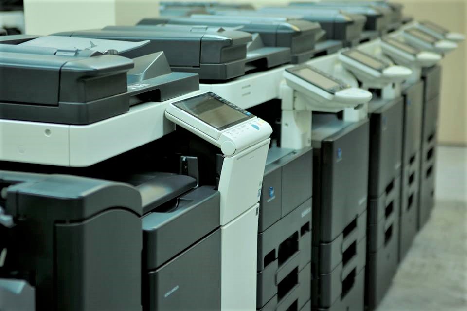 Row of Bizhub copiers for leasing